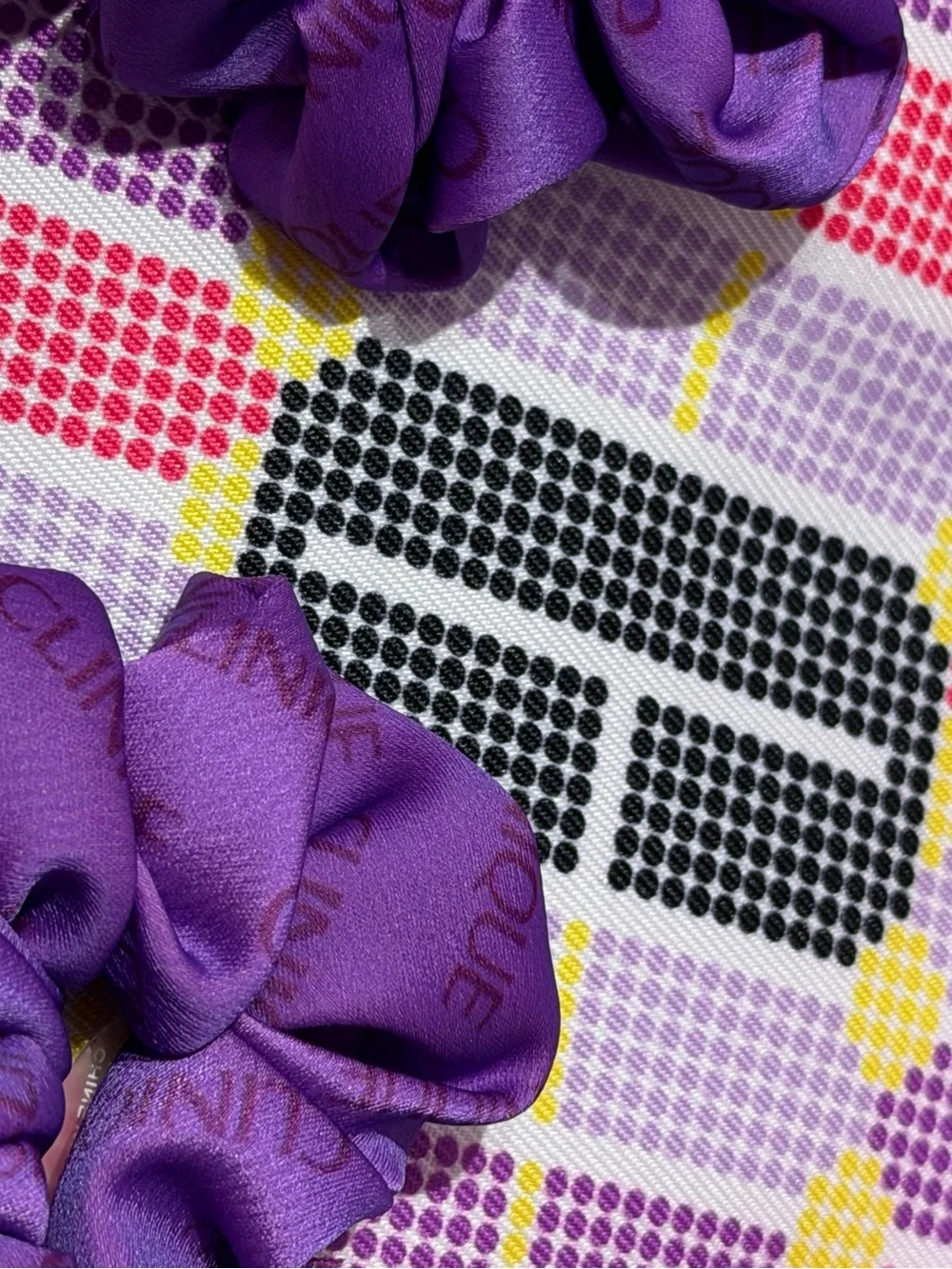 Clinique Pink Purple Yellow Patterned Cosmetic Bag with Purple Scrunchies